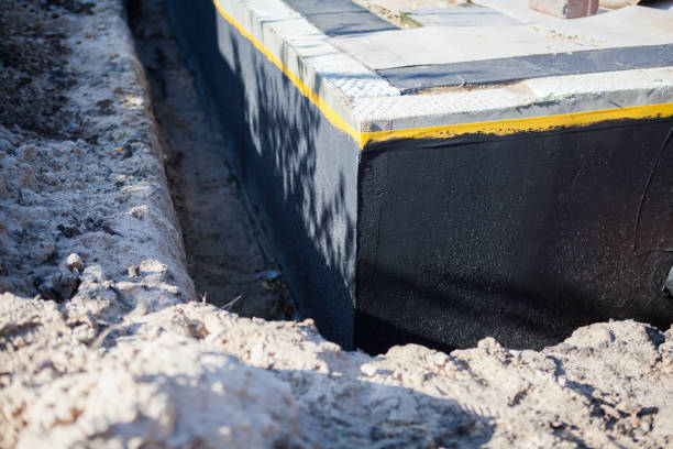 Professional Basement Waterproofing technician working in Poy Sippi, WI